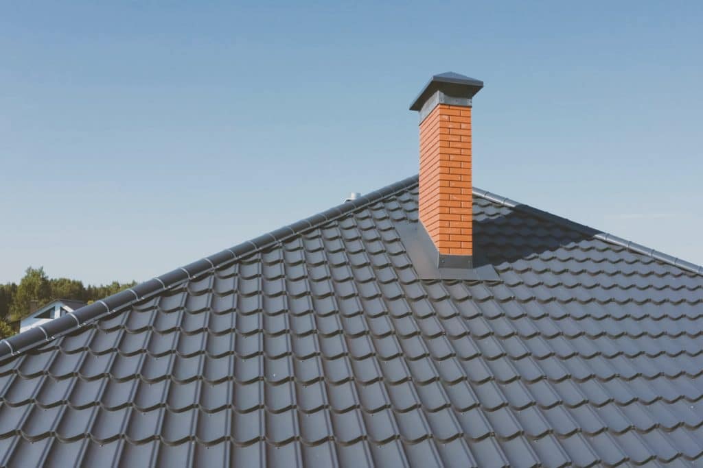 Modern roof made of metal. Corrugated metal roof and metal roofing.